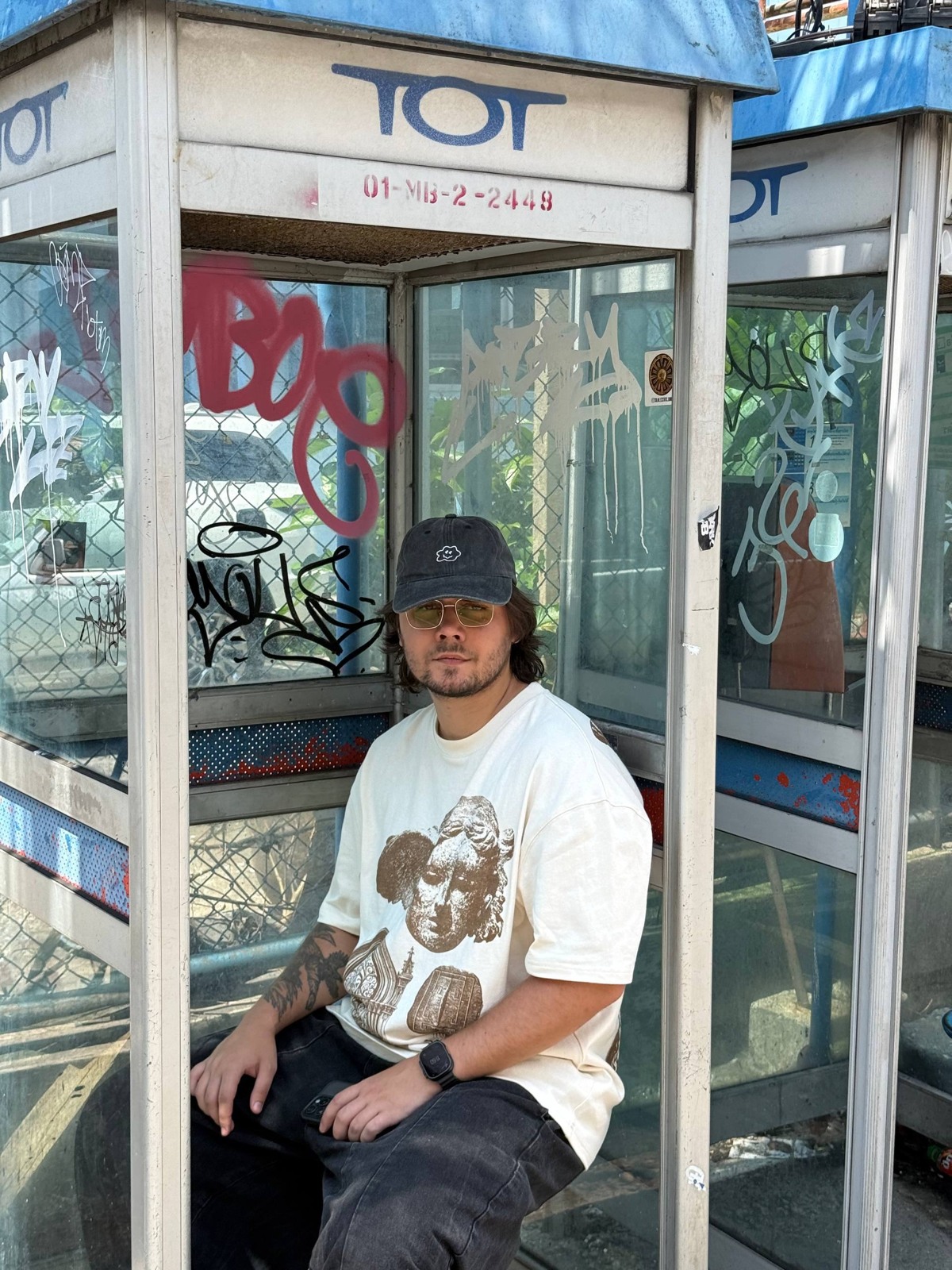 Dima Volkov in a telephone booth